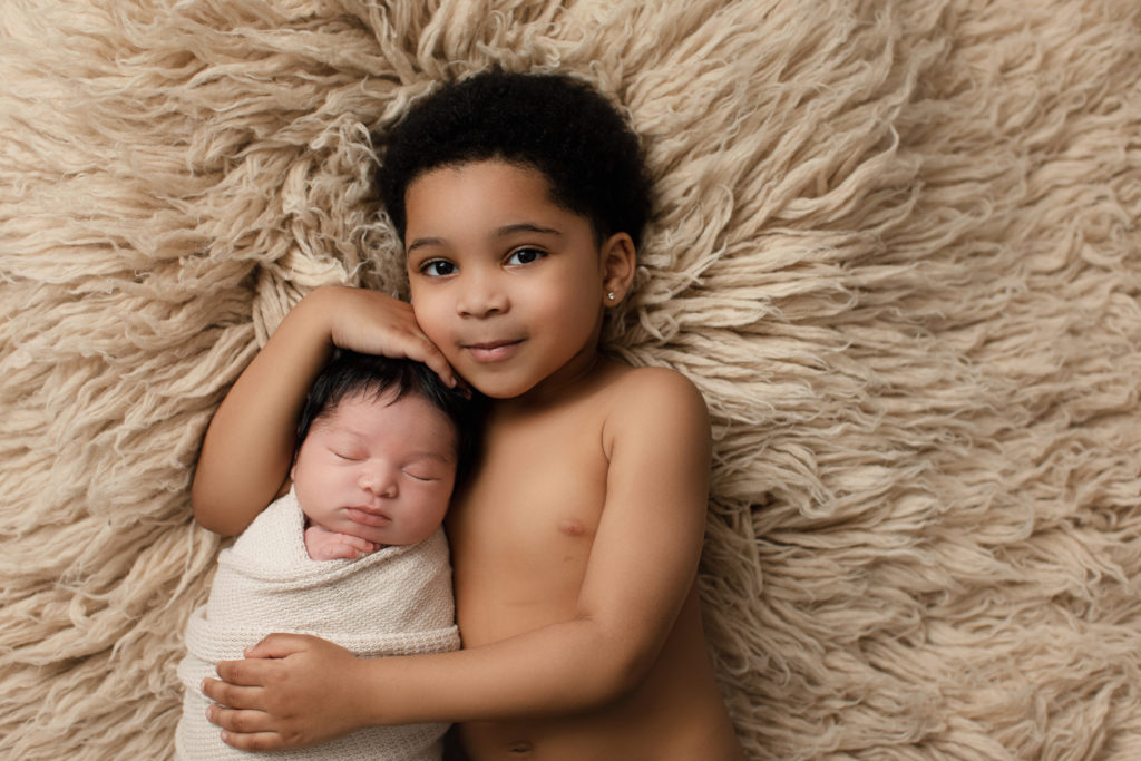 Boy with Newborn Sister