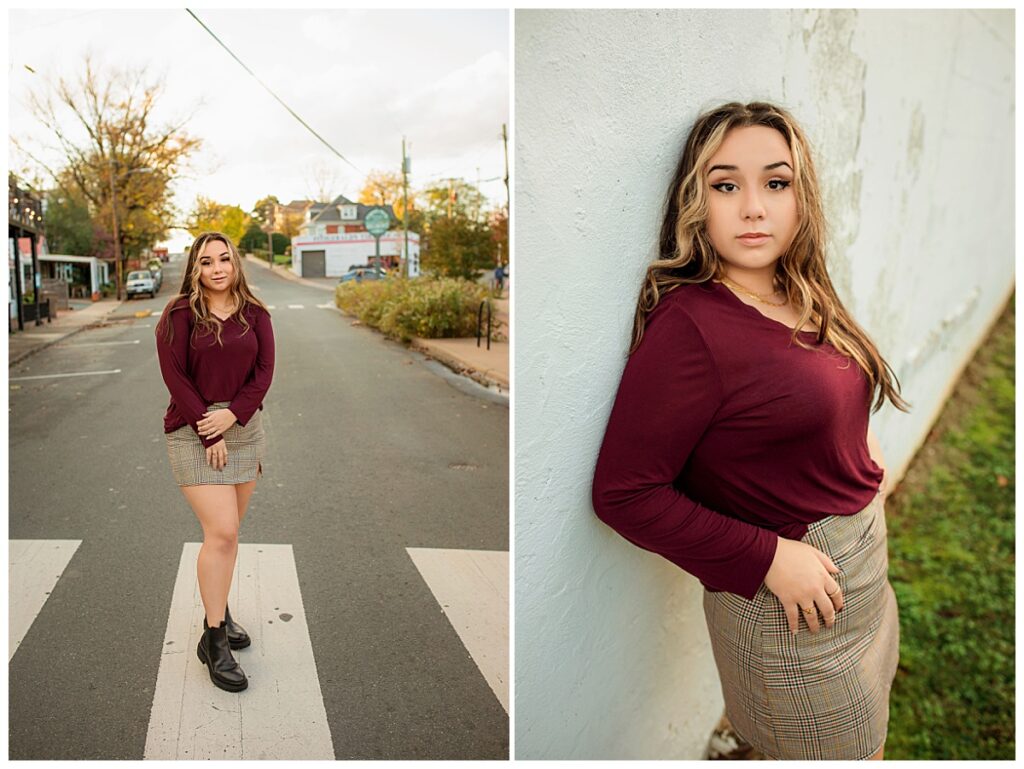 High school senior posing in downtown setting and leaning against a textured wall during an urban senior portrait session.