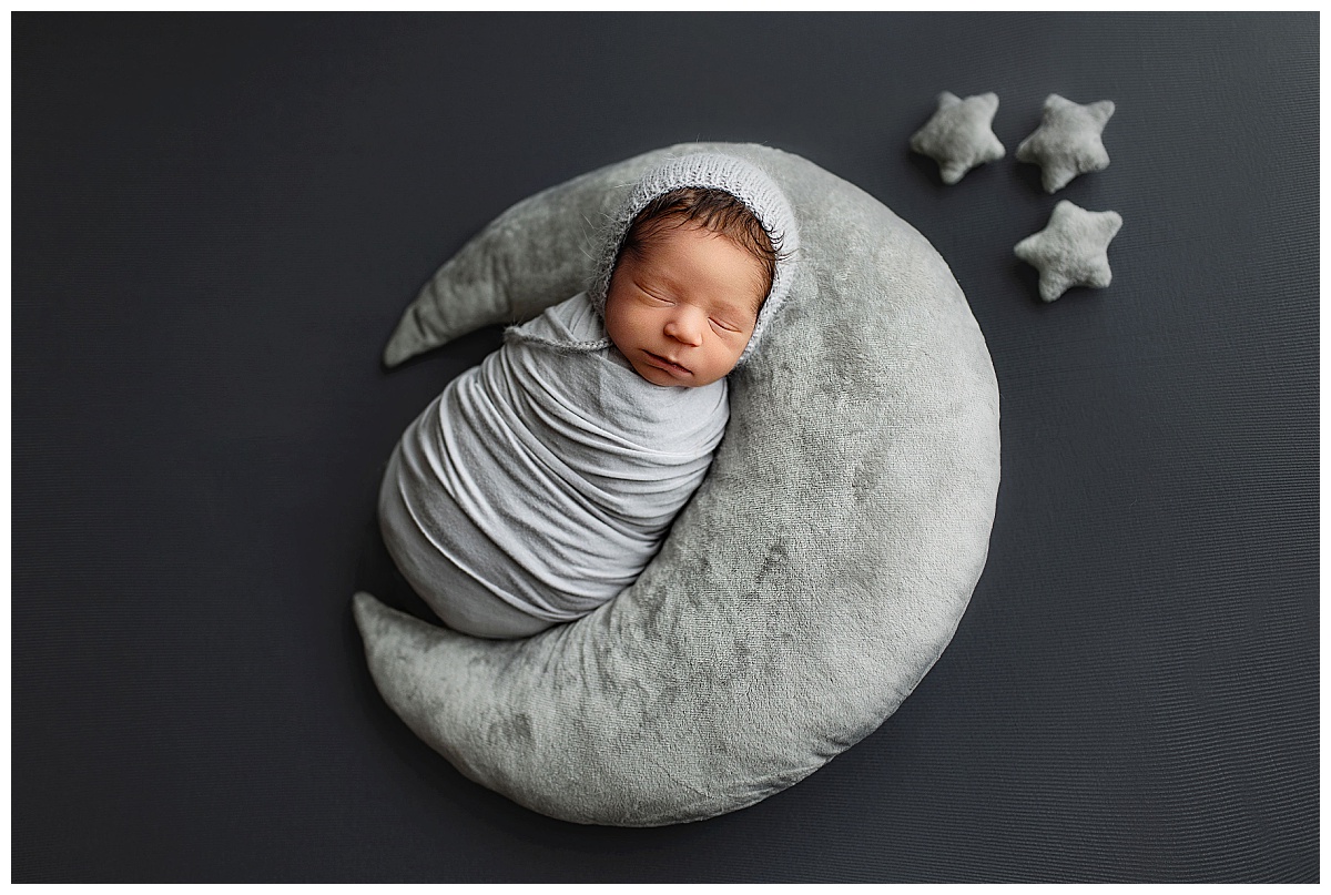 moon and star pillows cradle sleeping infant by Charlottesville photographer