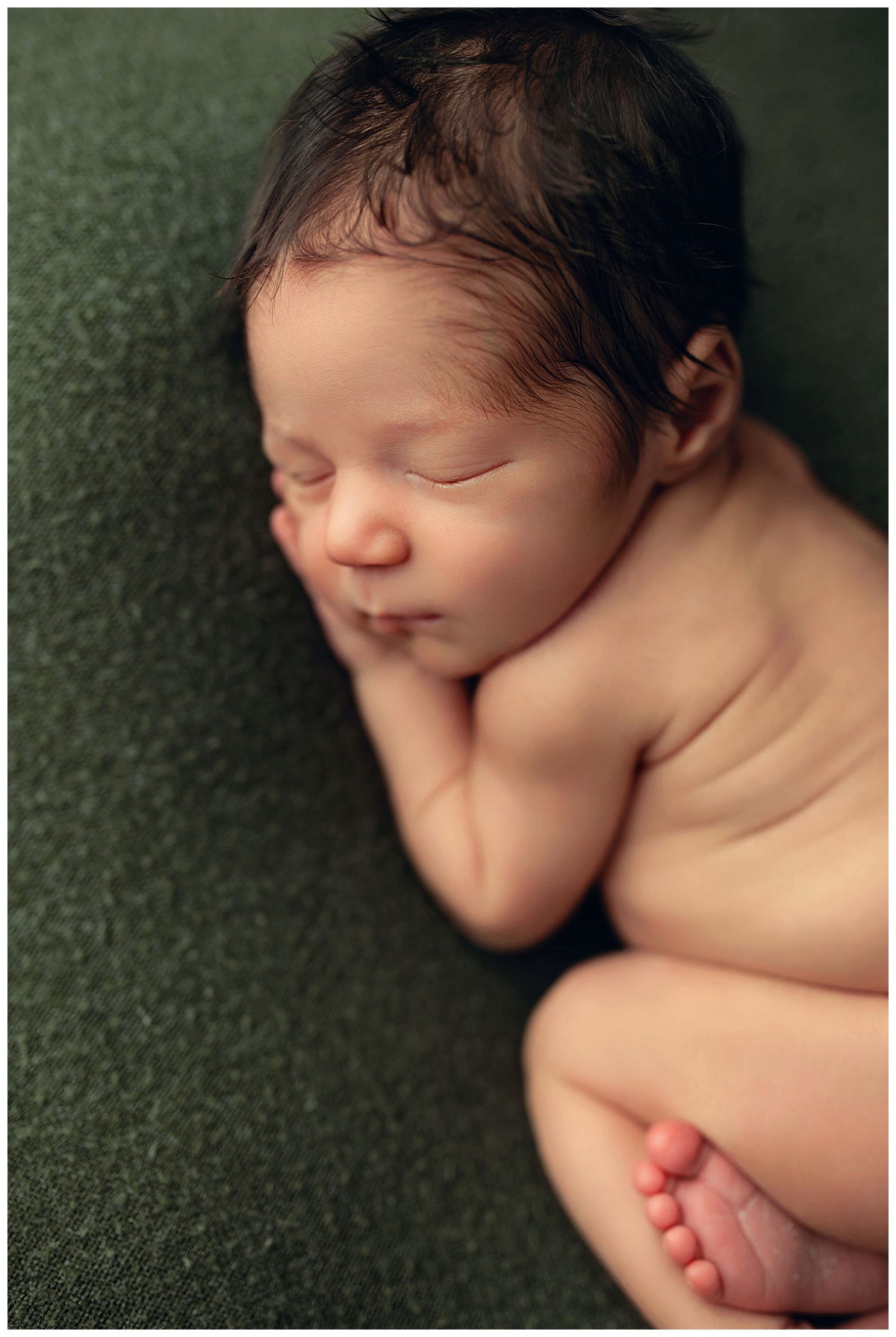tiny features are highlighted as infant sleeps by Charlottesville photographer