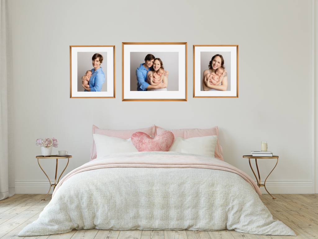 Heirloom newborn photography gallery wall displayed above a bedroom bed.